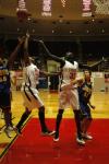 Christina Ray and Zeinab Chan battle to gain possession of the ball during the first game of the NAIA Tournament on Wednesday.  - Photo by Beth Spain