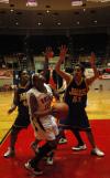 Christina Ray fights to make a basket during the first game of the NAIA Tournament on Wednesday. - Photo by Beth Spain