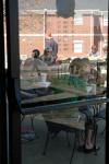 Several students at Union move their social time, homework and lunch outside of Barefoots Joe as the days warm up for Spring. - Photo by Beth Spain