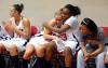 Kayla Hudson and Lavanda Ross share a hug after winning the semifinals of the 2009 NAIA tournament. - Photo by Kristi McMurry