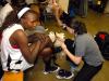 Josephine Owino has her ankle iced after the Lady Bulldogs win the seni-finals of the 2009 NAIA tournament. - Photo by Kristi McMurry