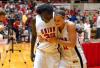 Zeinab Chan and Kaitlin Dudley walk happily off the court after winning the 2009 NAIA championship. - Photo by Kristi McMurry
