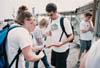 Troy Wallach, Emily Price, and Jenny Welch prepare to minister in downtown Jackson after the May 2003 tornado. - Photo by Justin Veneman