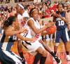 Christina Ray grabs a rebound during the NAIA national championship game. - Photo by Morris Abernathy