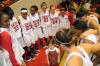 Union's Lady Bulldogs huddle up for a prayer just after winning the NAIA National Championship game. - Photo by Morris Abernathy