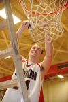 Union senior Matt Neaville cuts down a piece of the net after helping the Bulldogs win the 2009 TranSouth Conference Tournament championship. - Photo by Morris Abernathy