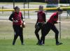 Katie Davis (left), Michelle Albonetti (center), and Kristin Kirk (right) get set to take their defensive positions in the outfield. - Photo by Steven Aldridge