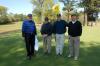 Harold Patrick, John Dancy, Harry Smith and Bob Campbell pose for a photo after finishing a hole at Union's first Roy L. White Golf & Gala golf tournament. - Photo by Morris Abernathy