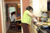 Alice Nettles, wife of Dr. Bill Nettles, prepares dessert for her guests.  Union students dined at the Nettles' home as a part of Be Our Guest. - Photo by Kristi McMurry