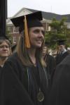 Heather Martin waits expectantly to receive her diploma during spring graduation. - Photo by Morris Abernathy