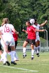 8/19/09 - Bridget Roney, sophomore athletic training major, goes up for a header against her Christian Brothers opponent. - Kristi McMurry