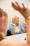 Katy Frayley, freshman, plays a game with her Focus group during orientation for new students. - Photo by Kristi McMurry