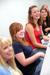 Freshmen Katy Frayley, Lindsay Bates, Kathryn Holloway, and Nadja Barros enjoy their first Focus group meeting during new student orientation. - Photo by Kristi McMurry