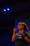 Focus leader Natalie West, senior journalism major, participates in a skit during the Focus show for incoming freshmen. - Photo by Kristi McMurry