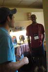JD Cressman, junior marketing major, speaks with Joshua Morgan, freshman psychology major from Cordova, Tenn., as he moves into his new room.  - Photo by Sarah Palmer
