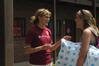 Shelbi Turner, sophomore nursing major, the resident adviser of the Lee building in the Heritage Complex, welcomes Sarah Smith, freshman nursing major from Bartlett, Tenn., as she moves into her new room. - Photo by Sarah Palmer