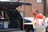 Steve Holmes prepares to take his daughter's things to her new room during freshman move-in. Holmes' daughter, Shelby Holmes, is an incoming freshman. - Photo by Kristi McMurry
