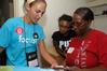 Senior Business major Chanel Watson meets one of her Focus students, Apree Jackson, and her mother Lavonda Capbell, from Memphis, Tenn., during move-in day in the Heritage Complex. - Photo by Beth Spain