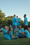 Students enjoy ice cream and new friends during an ice cream social at President Dockery's house during new student orientation. - Photo by Beth Spain