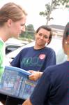 Meredith Gunn, sophomore nursing major, helps move an incoming freshman move into the dorms on freshman move-in day. - Photo by Kristi McMurry
