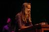 Emily Logan reads scripture during the new student worship service during orientation. - Photo by Beth Spain