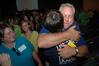 After a long day of moving onto campus, Freshman Tyler Strong hugs his father, Jeff, goodbye at the new student worship service during orientation. - Photo by Beth Spain