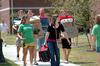 Returning students move into their rooms in the Quads with the help of friends. - Photo by Beth Spain
