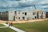 Construction on the new commons building continues as 
students move into their rooms in the Quads. - Photo by Beth Spain