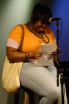 Freshman Ebony Right reads an original poem for the Focus Open Mic during new student orientation. - Photo by Sarah Palmer