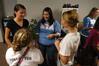 Ebbie Davis, sophomore media communications major, speaks with Freshmen Anna Marie Deschenes, Bethany Crann, and Brittany Bural about joining Zeta Tau Alpha. - Photo by Sarah Palmer