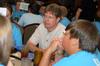 Mark Bolyard, professor of biology and department chair, talks with incoming freshmen who are interested in the biology department during new student orientation. - Photo by Kristi McMurry