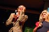 The hosts of the SAC game show look in the audience for contestants for Right is the Price. This annual game show is a way for freshmen to win prizes and have fun. - Photo by Kristi McMurry