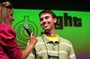 Jonathan Gwaltney, freshman, answers questions from one of the hosts of the SAC Game Show, Right is the Price.
 - Photo by Kristi McMurry