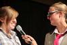A freshman contestant for the SAC game show answers questions from one of the hosts of the game show. This annual game show is a way for freshmen to win prizes and have fun. - Photo by Kristi McMurry