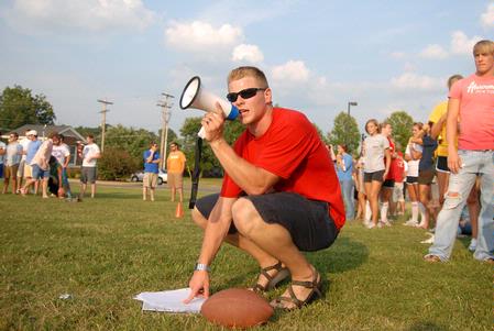 Blake Pennington, new intramural director, calls instructions for the football punt and pass competition that kicked off the fall intramural season.