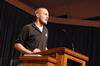 John Winfree, junior Christian studies major, gives a short testimony about his GO trip in chapel. - Photo by Kristi McMurry