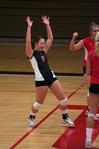 Kacie Ritter, junior, celebrates with her teammates after getting a point against Lyon College. - Photo by Kristi McMurry