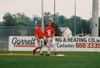 Union first baseman Josh Allen of Jackson and 2000 alumnas John Melton have a laugh as the current Bulldogs battle the alumni. - Photo by Steven Aldridge
