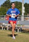 Former Union cross country standout John Fox wins Union Cross Country Invitational individual title as an unaffiliated runner. - Photo by Uncredited