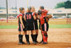 The Lady Bulldog infield talks strategy during a game in the 2003 NAIA Softball World Series in Decatur, Ala. - Photo by Steven Aldridge