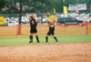 Amanda Dixon (1) breaks for her position in right field.  Allison Shein (2) and Holly Haycraft (not seen) head for left and center field respectively.  2003 NAIA Softball World Series in Decatur, Ala. - Photo by Steven Aldridge