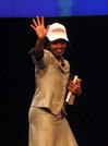 Condoleezza Rice dons her new Union University NAIA championship hat at the close of the 2009 Scholarship Banquet. - Photo by Morris Abernathy