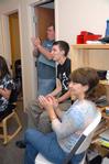 Kevin Scalf, Matt Scalf, junior digital media studies major, and Lynne Scott, spend time together in Matt's dorm during Family Weekend. - Photo by Kristi McMurry