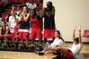 The Lady Bulldogs cheer for students participating in a three-pointer competition at Bulldog Madness, an annual event that gets students and community members pumped for the upcoming basketball season. - Photo by Kristi McMurry