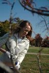 Sarah Stinson, senior English major, lays mulch around trees at Liberty Park during Campus and Community Day. - Photo by Beth Spain