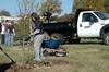 Lindsay Dawkins, senior advertising major, spreads mulch around a tree as Union students participate in beautification projects at Liberty Park during Campus and Community Day. - Photo by Beth Spain
