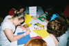 Union students write letters and make cards for young patients at St. Jude Children's Research Hospital at one of the many stations during <i>Up 'Til Dawn.</i> - Photo by Justin Veneman