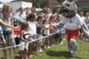 Buster gets some high-fives from fans at a Jump 5 concert sponsored by Union in Franklin, Tenn. - Photo by Jim Veneman