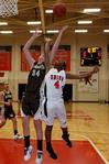 Jessica Graves, senior sports medicine major, goes up for the rebound during a game against St. Francis on Nov.7. - Photo by Megan Bailey