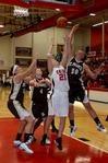 Kayla Bryant, junior, goes up for the rebound against St. Francis on Nov.7. - Photo by Megan Bailey